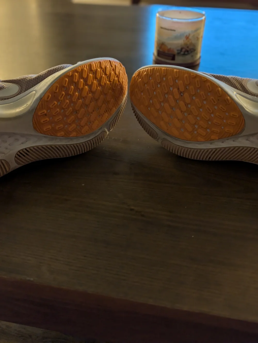 Nike Women’s React Running Shoes in Peach with Orange Highlights